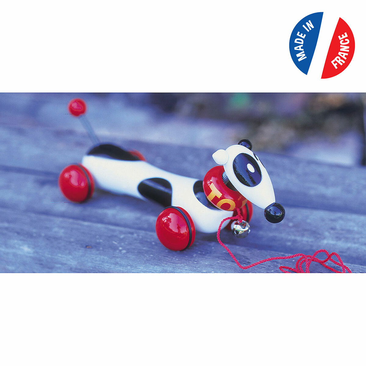 Un grand chien à traîner en bois massif made in France.