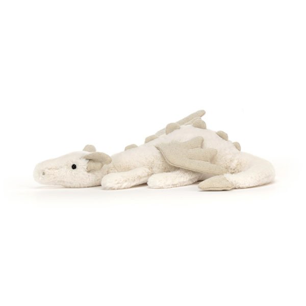 D'une jolie couleur blanc crème, la peluche Dragon des Neiges ne demande qu'à être câliné.