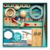 intérieur de la boite du jeu Zig & Go Roll avec les billes en métal la bille en bois les dominos un cercle de bois des rampes...