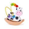 Ce joli boulier vache à bascule est un jouet d'éveil en bois destiné aux enfants dès l'âge de 1 an.