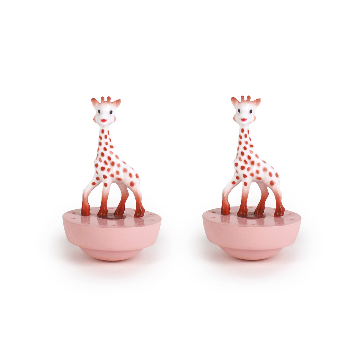 Boîte-à-musique-Sophie-la-Girafe-rose Les figurines aimantées dansent avec la musique en tournant en rond pour le plaisir des yeux des grands et des petits. Ce manège musical est un très bel objet de décoration pour la chambre de bébé qui participe à l'éveil musical et visuel de votre bébé.