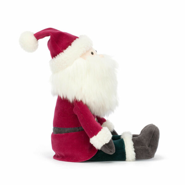 Papa Noël a de beaux habits rouges et blancs. Il est chaussé de grandes bottes et porte une jolie tunique rouge et blanche avec un bonnet à pompon assorti !