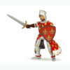 La figurine Prince Philippe rouge vous entraîne au temps des châteaux forts et des chevaliers.